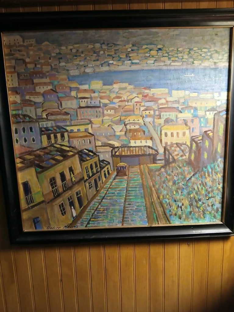 Óleo de ciudad costera con funicular